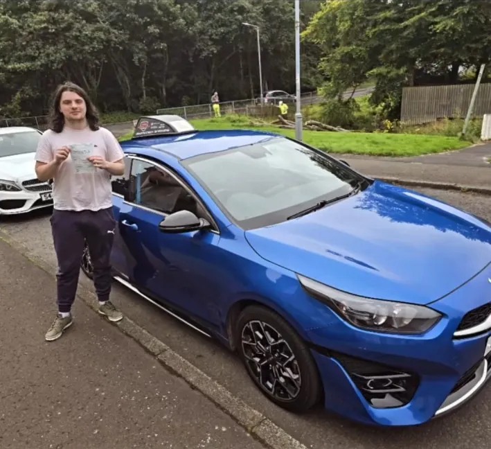 Joseph after passing his driving test with Bravo's